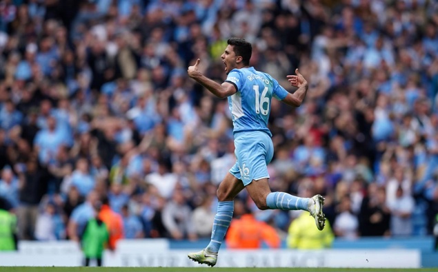 Manchester City's Rodrigo runs to celebrate after scoring his side's second goal against Aston Villa. Photo / AP