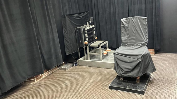 This photo provided by the South Carolina Department of Corrections shows the state's death chamber in Columbia, South Carolina, including the electric chair, right, and a firing squad chair, left. Photo / AP
