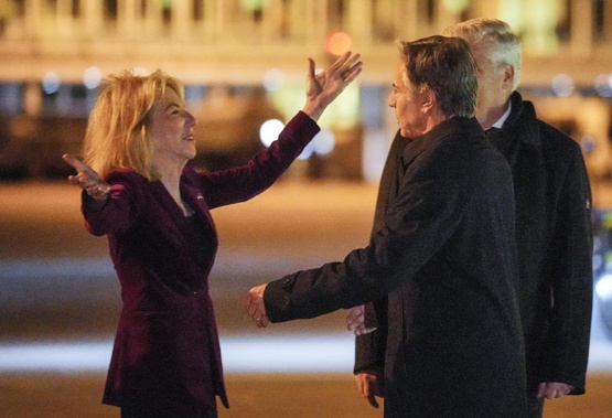 U.S. Secretary of State Antony Blinken, right, is welcomed by U.S. Ambassador to Germany Amy Gutmann at the airport in Greven, Germany, Wednesday, Nov. 2, 2022 as he arrives to participate in the upcoming G7 Foreign Ministers's Meeting in Muenster, Germany. (AP Photo/Martin Meissner)