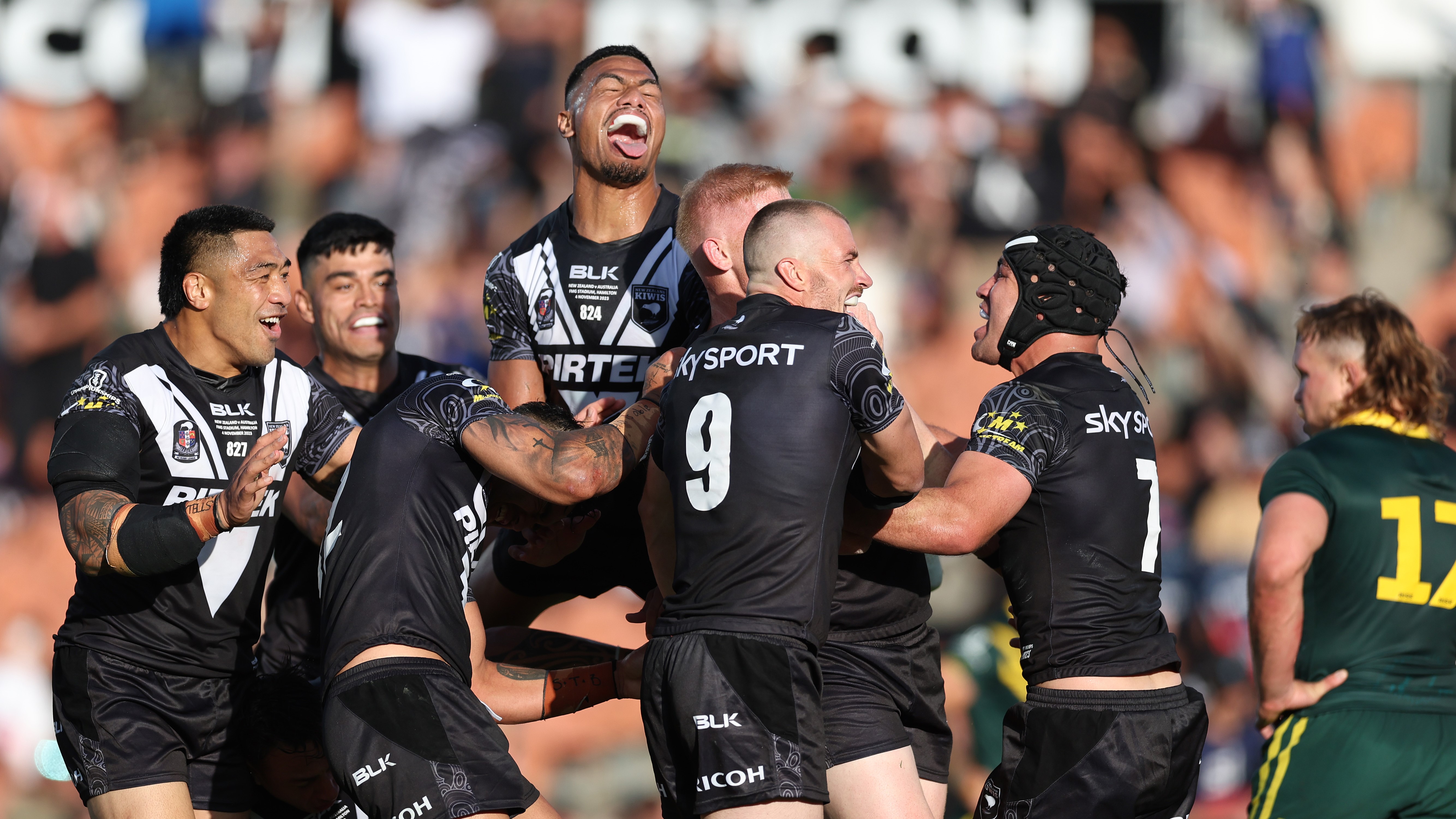 The New Zealand Kiwis celebrate a try to Griffin Neame during the Men's Pacific Championship Final match between Australia Kangaroos and New Zealand Kiwis at Waikato Stadium on November 04, 2023 in Hamilton, New Zealand. (Photo by Phil Walter/Getty Images)