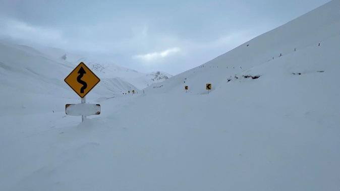 A large dump of snow on the summit of the Crown Range Road. (Photo / Downer / QLDC)