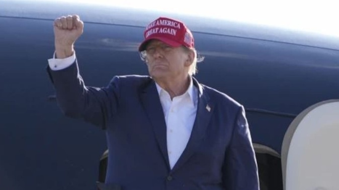 Former President Donald Trump gestures towards the crowd at a campaign rally. Photo / AP