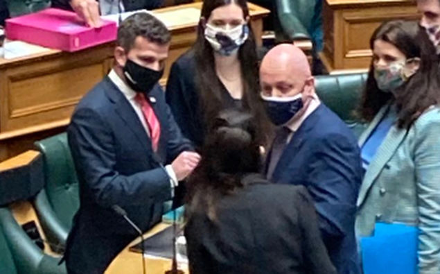 Chris Luxon and Jacinda Ardern shook hands before Question Time on Tuesday. (Photo / Claire Trevett)