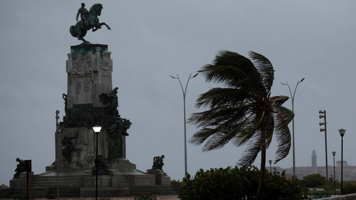 Howling wind blows at the Antonio Maceo Monument along the malecon sea wall during the passing of Hurricane Ian in Havana. Photo / Ismael Francisco, AP
