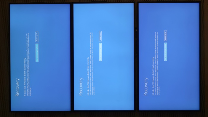 Blue screens of death on display at the Amtrak South Station ticket area, due to the CrowdStrike outage. (Photo by David L. Ryan/The Boston Globe via Getty Images)