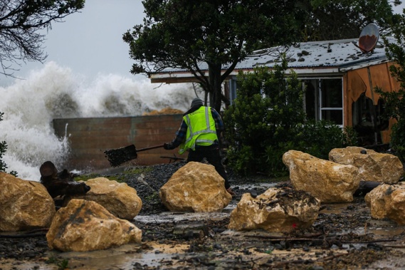 The clean-up from flooding along Clifton Rd in Haumoana on Wednesday morning, across the road from Haumoana shops. Photo / Paul Taylor
