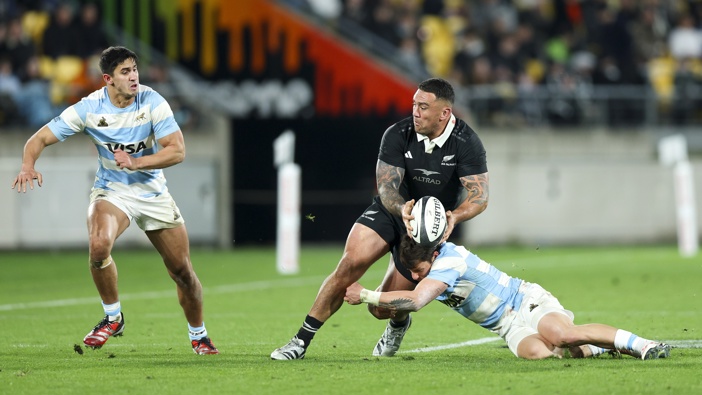 Codie Taylor of New Zealand is tackled during the International Test match between New Zealand All Blacks and Argentina at Sky Stadium on August 10, 2024 in Wellington, New Zealand. (Photo by Hagen Hopkins/Getty Images)