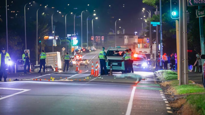 The Serious Crash Unit investigating a fatal vehicle crash on Great South Rd where a pedestrian was struck and killed while crossing the road. Photo / Hayden Woodward