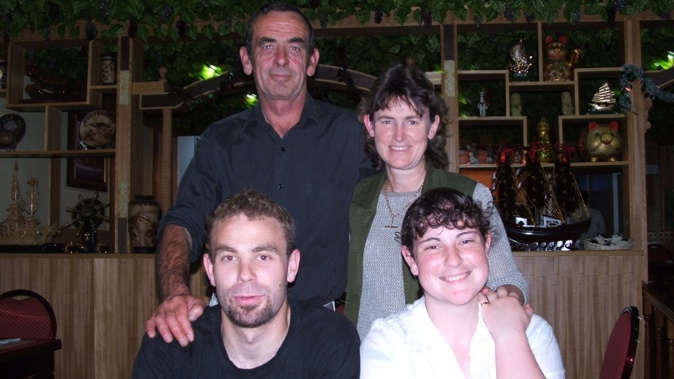Mike Gutsell and Glenda Graham (standing) with their children, Ben and Katy Gutsell, at Katy's 21st birthday celebration in 2005. Photo / supplied