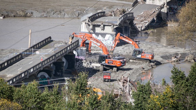 Demolition is under way on parts of the Redclyffe Bridge, otherwise known as Waiohiki Bridge. Photo / Warren Buckland