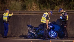 Police at the scene of the serious crash involving a motorcyclist near Grafton Rd in Auckland Central. Photo / Hayden Woodward