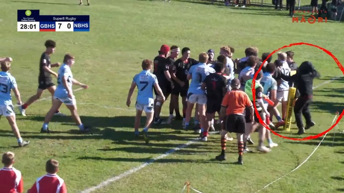 A hooded man stormed the field during an altercation in a school rugby match and punched a player from Napier Boys' High School. Photo / Whakaata Māori