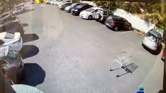 Footage shows a trolley barrelling into Kelly Hamilton's car.