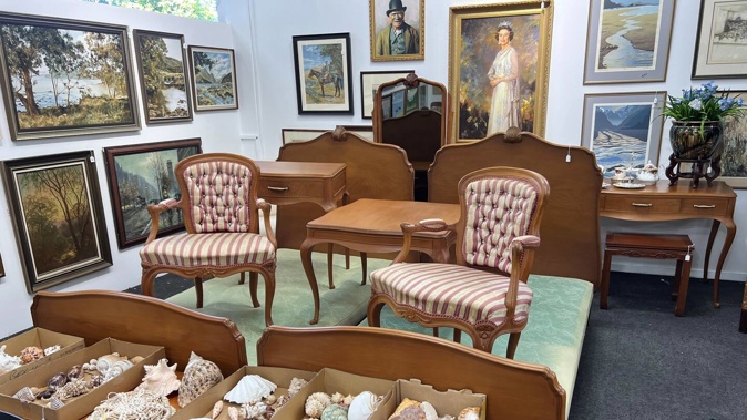 This bedroom suite, made for Queen Elizabeth II and Prince Philip, is going up for auction in Hamilton. Photo / Supplied
