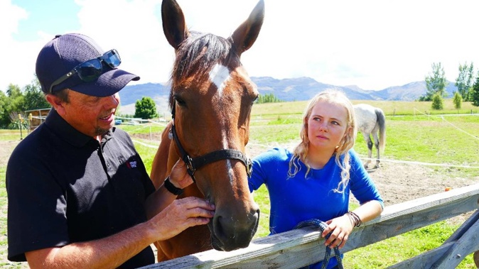Fitzpatrick Rd residents John Quinn and his daughter Cara, with her 10-year-old showjumping horse Dakota, are worried about the effect a planned fireworks display in their area next Saturday night will have on nearby animals. Photo / Tracey Roxburgh