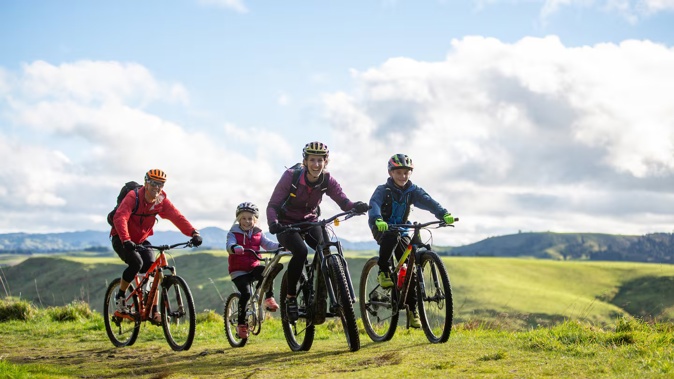 Family fun on Ohakune's Old Coach Road. Photo / Mountains to Sea-Plateau Productions