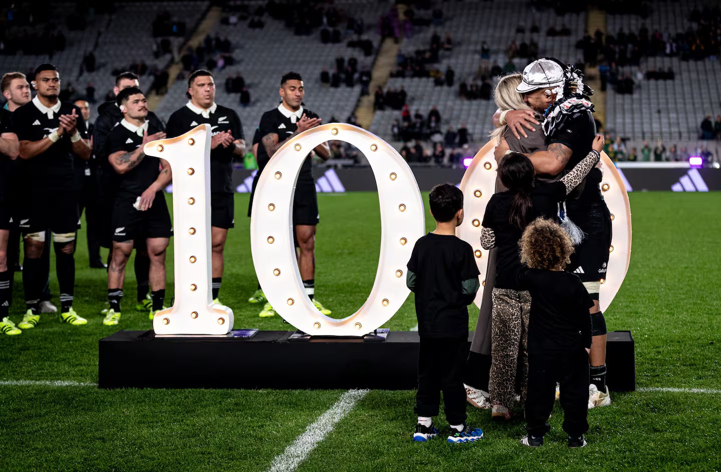 Ardie Savea celebrates his 100th test with his family at Eden Park. Photo / Dean Purcell