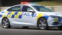 Two people injured, SH1 closed after crash