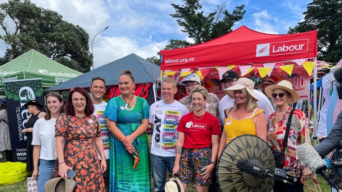 Prime Minister Chris Hipkins, Deputy Prime Minister Carmel Sepuloni and Finance Minister Grant Robertson with Labour Party members at the Big Gay Out. Photo / Azaria Howell