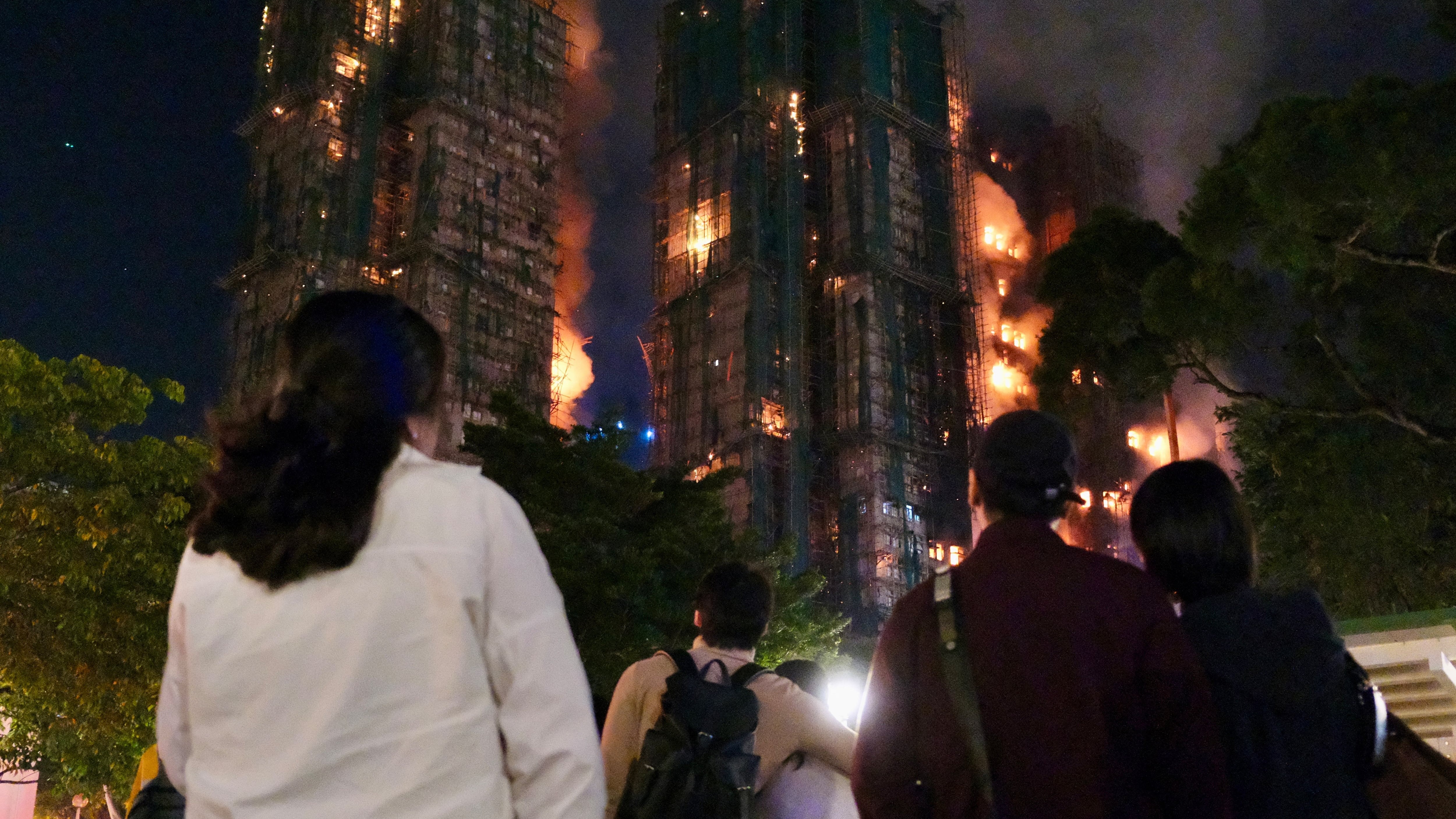 At least 36 dead as fire engulfs Hong Kong apartment towers