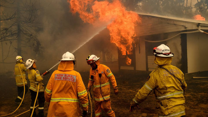 Last week, officials counted 70 active fires in Queensland alone. Photo / AP