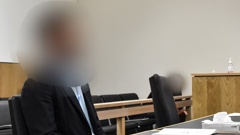 An Auckland businessman accused of assaulting a woman in March 2022 sits in court on the first day of his trial in the Auckland District Court on November 26, 2024. Photo / George Block