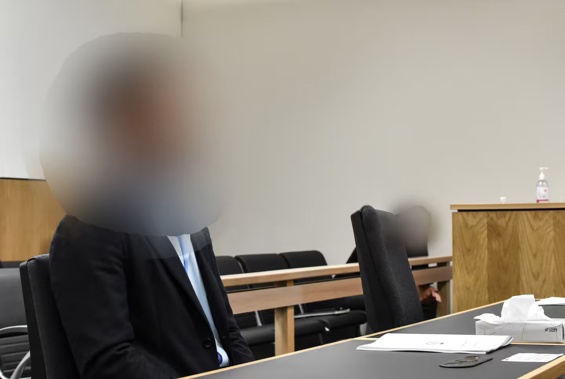 An Auckland businessman accused of assaulting a woman in March 2022 sits in court on the first day of his trial in the Auckland District Court on November 26, 2024. Photo / George Block