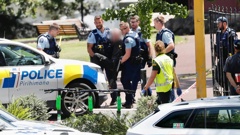 A man is arrested after a stand-off with police in Auckland's Albert Park. Photo / Dean Purcell