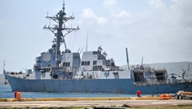 US naval flotilla and deadly strikes spark fears of wider Venezuela conflict