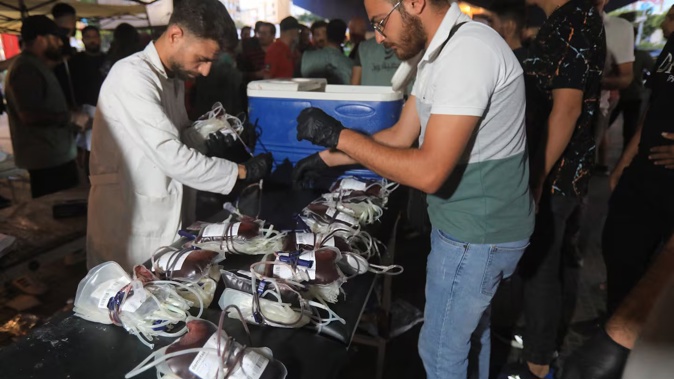 Medics collect blood donations in Beirut's southern suburb after explosions hit locations in several Hezbollah strongholds around Lebanon amid ongoing cross-border tensions between Israel and Hezbollah fighters. Photo / AFP
