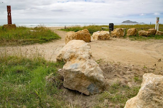 Limestone boulders have been placed to prevent vehicle access on Waimārama Beach. Photo / Warren Buckland.