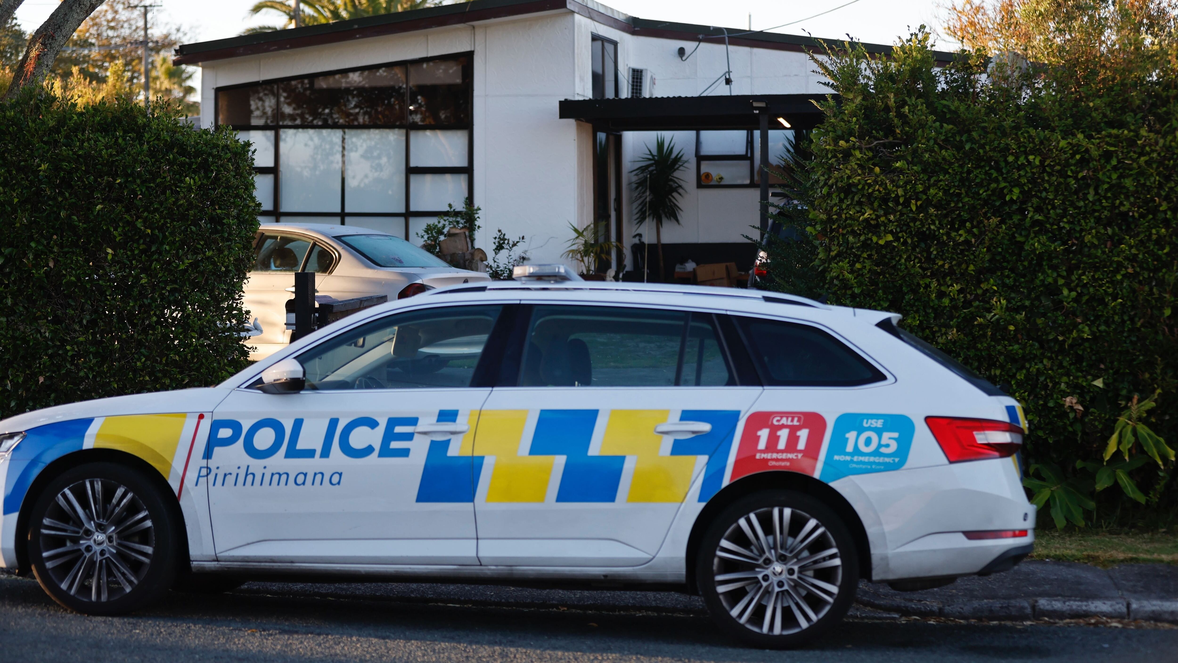 Police at a Beach Haven property where a woman was kidnapped after an altercation on April 2. Photo / Michael Craig