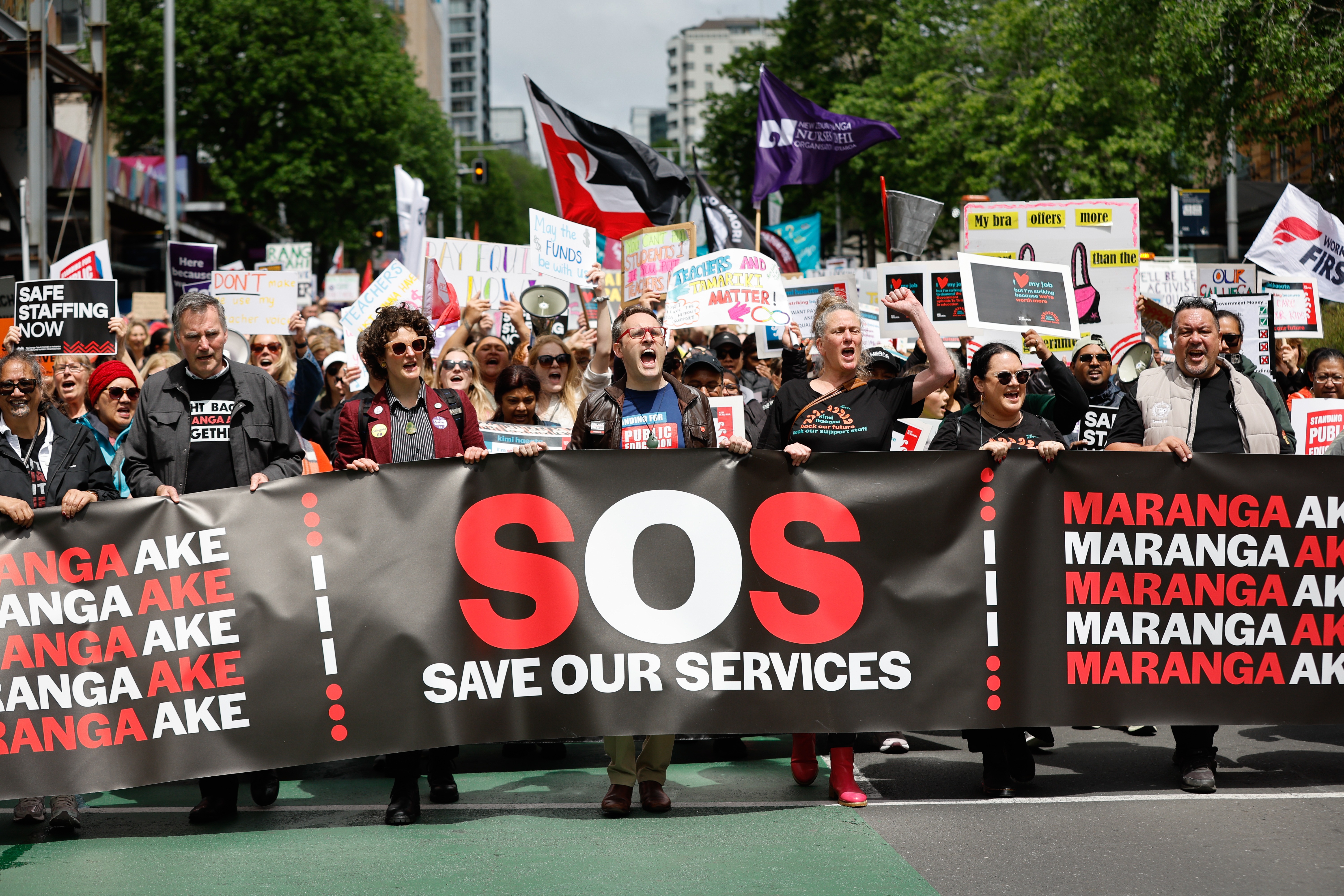 Tens of thousands marched from Aotea Square down Queen Street to support health and education workers in the SOS - Save Our Services Strike. October 23rd 2025.