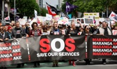 Tens of thousands marched from Aotea Square down Queen Street to support health and education workers in the SOS - Save Our Services Strike. October 23rd 2025.