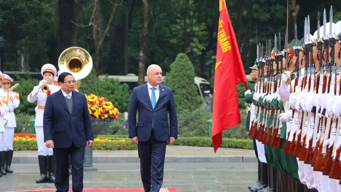 Prime Minister Chris Luxon in Vietnam, inspecting the guard of honour with Vietnamese Prime Minister Pham Minh Chinh - PHOTO / POOL Giles Dexter.