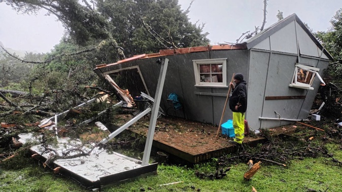 Lyric Godsmark, 25, suffered only minor injuries when her sleepout was destroyed by a falling tree. Photo / Lyric Godsmark