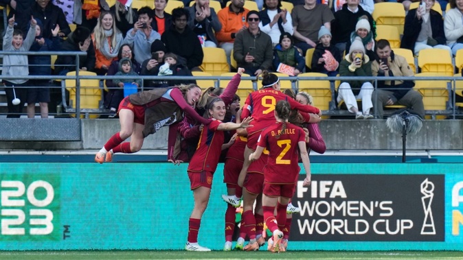 Spain celebrate after scoring against the Netherlands. Photo / AP