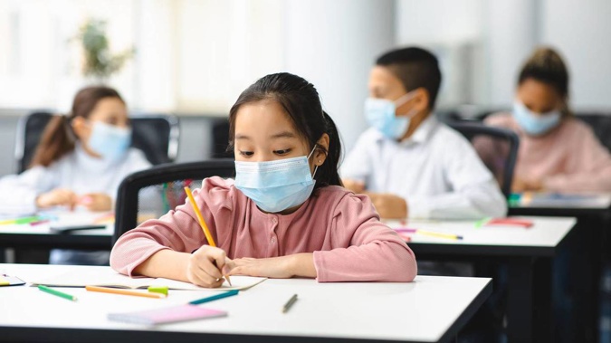 School is an essential service for children and should only close as a last resort, even amid an Omicron outbreak, paediatricians say. Photo / 123RF