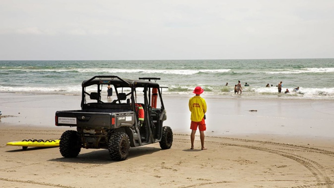 Lifeguards on patrol at Ōmanu Beach. Photo / Mead Norton