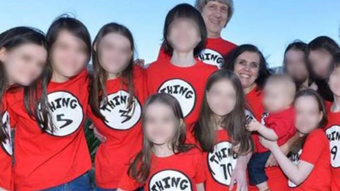 David Turpin and Louise Turpin with their 13 children. Photo / Supplied