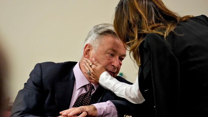 Actor Alec Baldwin speaks with wife Hilaria Baldwin during his hearing at Santa Fe County District Court on July 10 in New Mexico. Photo / Getty Images