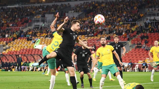 Chris Wood looks to connect with a free kick against Australia. Photo / photosport.nz