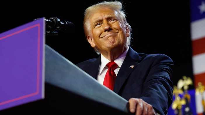 Former US President and Republican presidential candidate Donald Trump arrives for an election night event at the West Palm Beach Convention Center in Florida. Photo / AFP