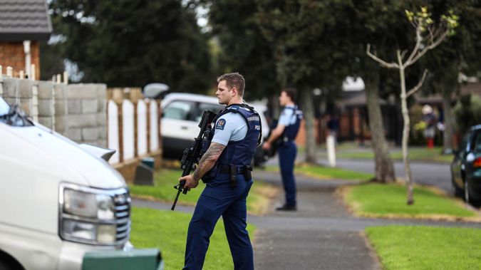Armed police at the scene of a suspected hit and run incident on Thomas Road Mangere. (Photo / NZ Herald)