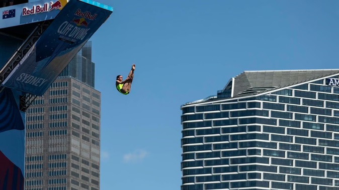 Antonina Vyshyvanova of the Ukraine dives from the 21 metre platform during last year's Red Bull Cliff Diving World Series event in Sydney. Photo / Getty