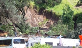 A large-scale emergency operation is underway at Mount Maunganui Beachside Holiday Park following a large landslide, with reports multiple people are unaccounted for. Photos / Cameron Avery