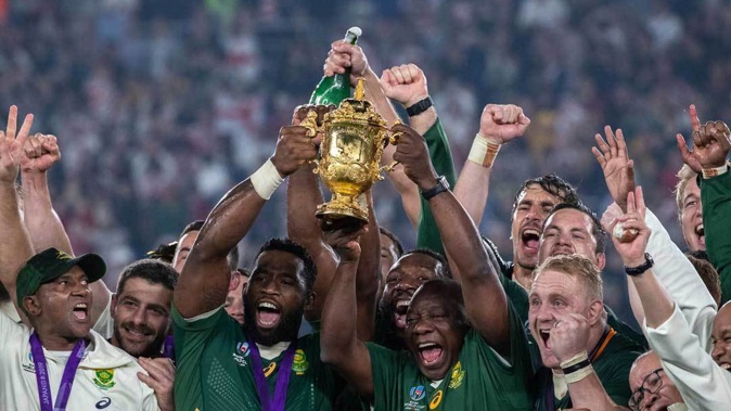 The Springboks celebrating with the Webb Ellis Cup after their victory over England in the Rugby World Cup 2019 final. (Photo / Mark Mitchell)