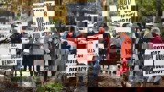 Protesters march against the Rotorua Lakes Council's proposed representation model in March. Photo / Andrew Warner