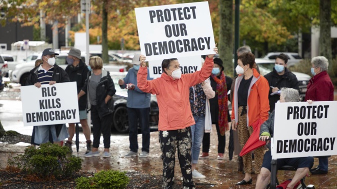 Protesters march against the Rotorua Lakes Council's proposed representation model in March. Photo / Andrew Warner
