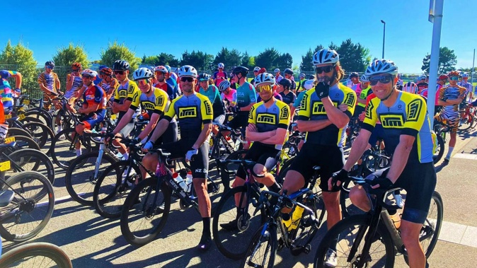 Euan Mason, second from left in yellow jersey, with teammates.